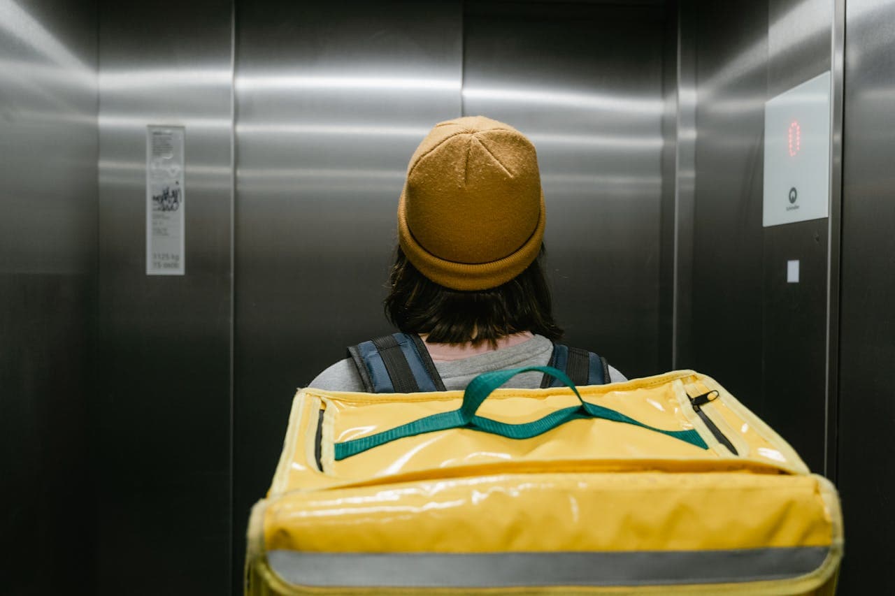 International student working part-time in Belarus in delivery service